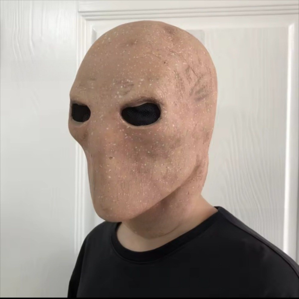 رجل مجهولي الهوية هالوين نحيل  - مراجعة Latex Alien Mask Realistic وسعره