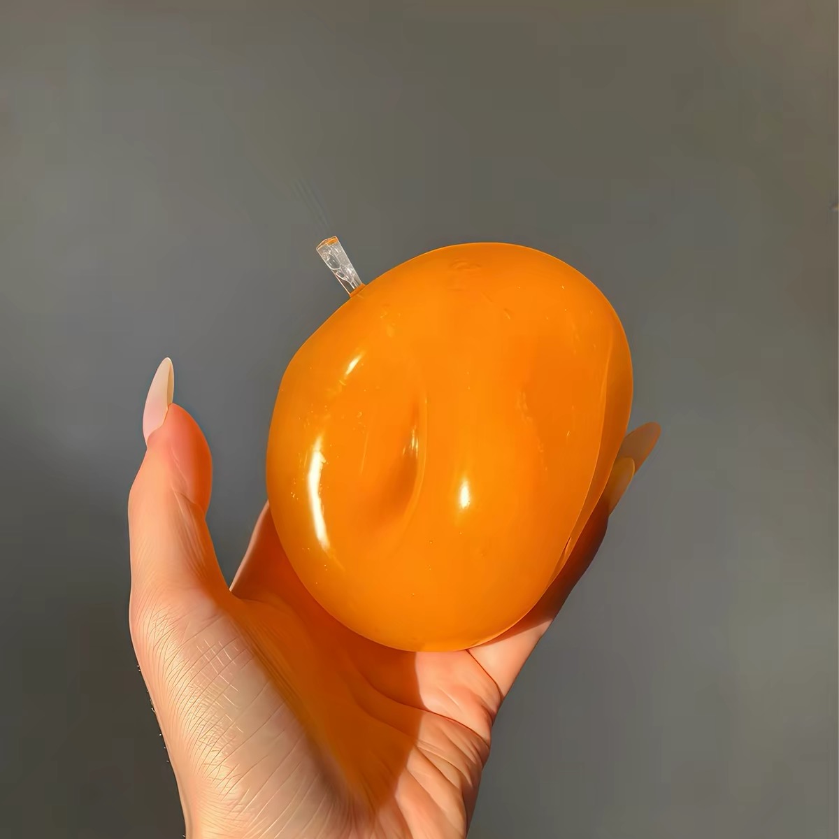 لعبة سكويشي برتقالية يدوية الص - مراجعة Novelty Gifts وسعره